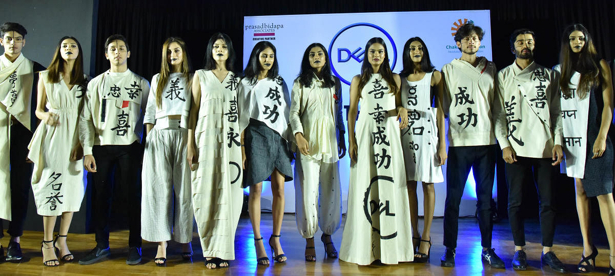 Models walks the ramp at the Rangoli Metro Art Centre in Bengaluru on Sunday to showcase exclusive collection made from khadi designed by Designer Tahera Peeran during a create awareness about increasing levels of air pollution in Bangalore and promote sustainable practices. DH PHOTO