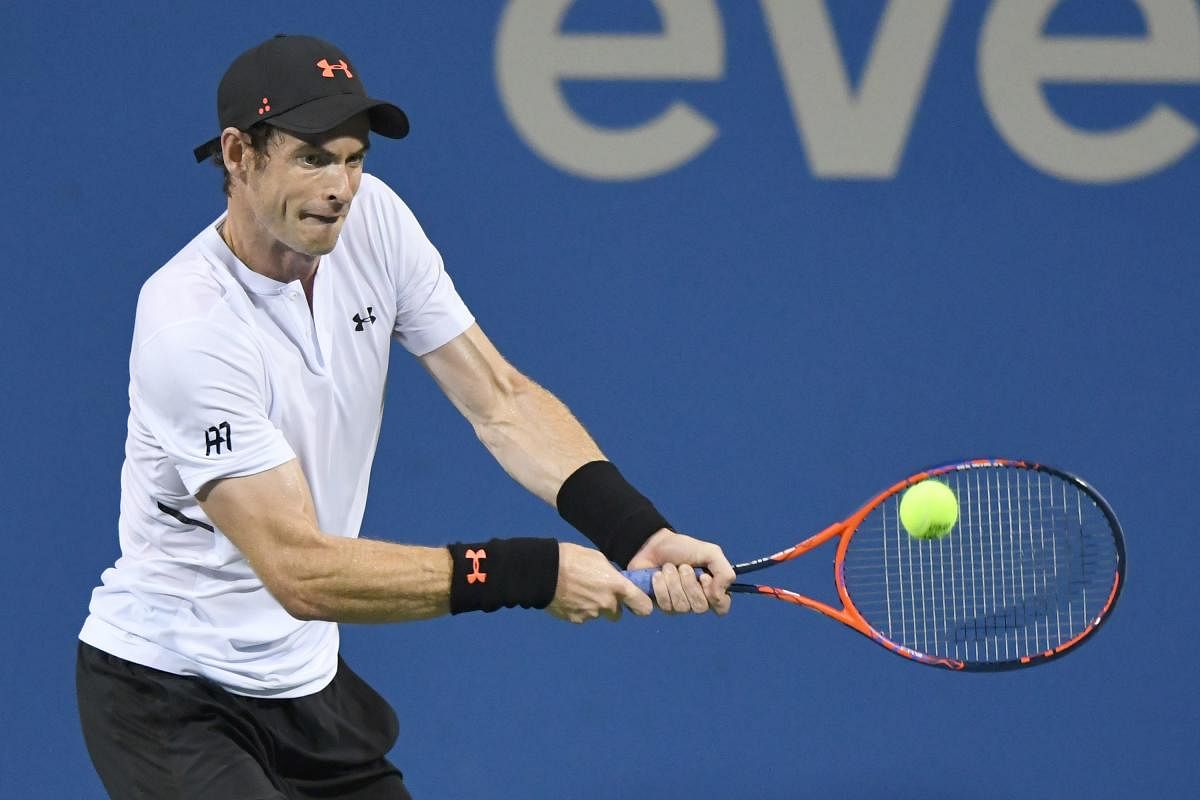 Britain's Andy Murray returns to Mackenzie McDonald during their first round match on Monday. AFP