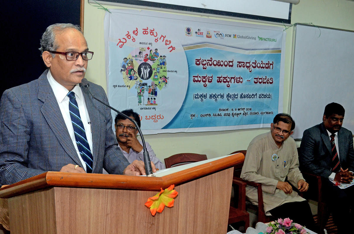 Dakshina Kannada Principal District and Sessions Judge Kadluru Satyanarayana Acharya speaks during the inauguration of a two-day orientation programme on Child rights organised by Child Rights Trust, at CODP in Mangaluru on Tuesday. Senior Civil Judge Mal