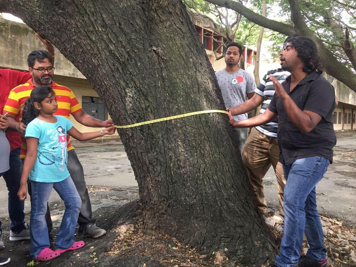 Volunteers conduct the tree census in front of BDA complex, Indiranagar, on Friday.
