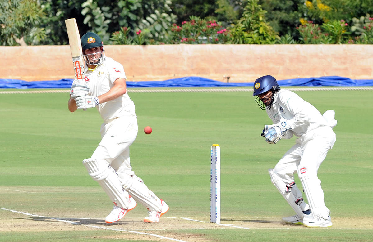 Mitchell Marsh of Australia 'A' plays a shot during his unbeaten 86 against India 'A' at the Alur ground in Bengaluru on Saturday. DH Photo
