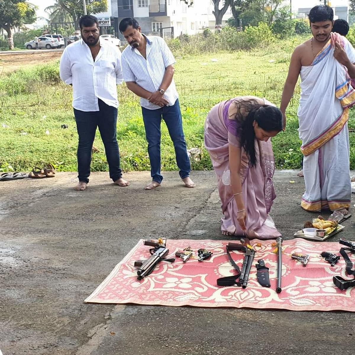 A screenshot of N Muthappa Rai and his wife at the 'gun puja'. file photo