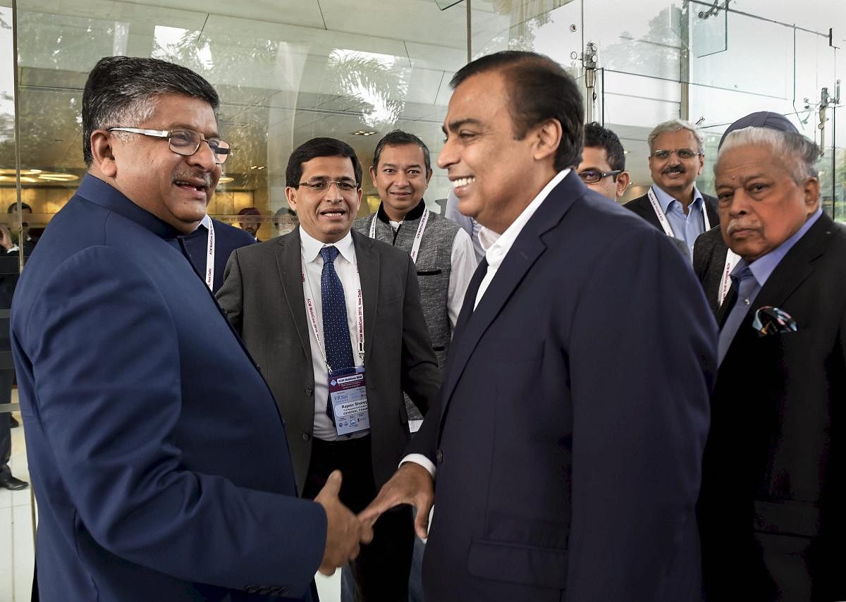 Union Minister for Electronics and Information Technology Ravi Shankar Prasad with Reliance Industries Limited Chairman Mukesh Ambani at 24th Annual International Conference on Mobile Computing and Networking (ACM Mobicom) 2018, in New Delhi, Tuesday, Oct
