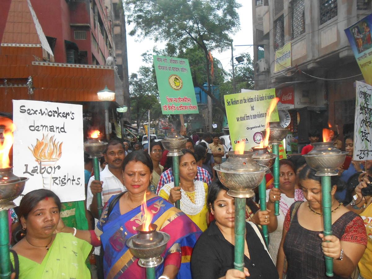 Sex workers of Sonagachi take part in an agitation in Kolkata.