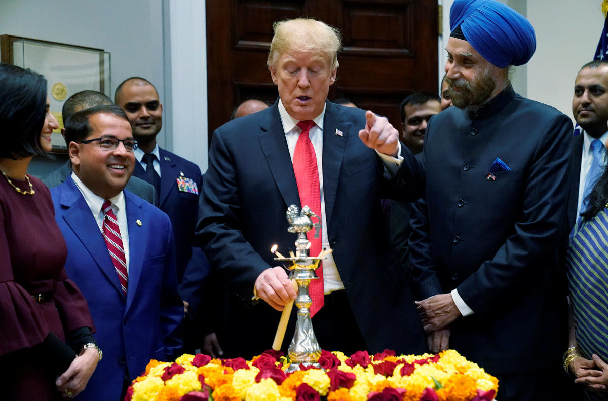 U.S. President Trump participates in the Diwali ceremonial lighting of the Diya at the White House in Washington. Reuters photo