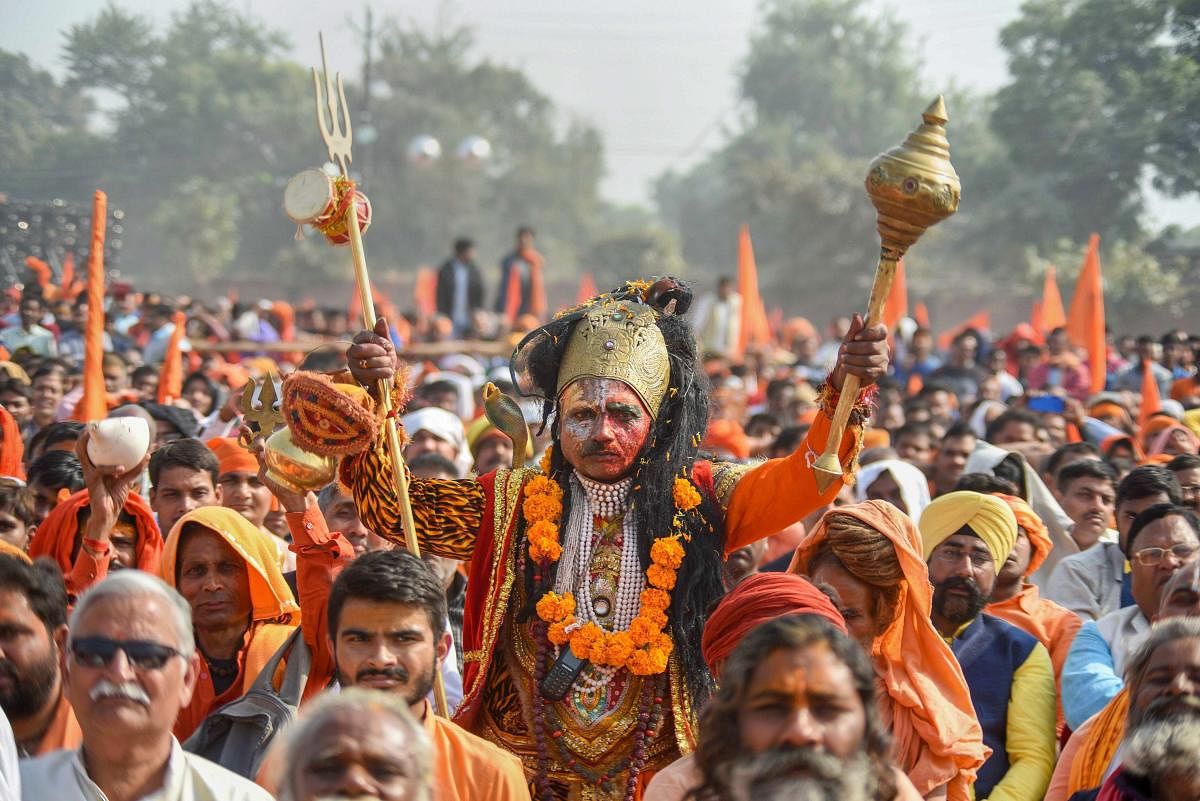 People participate in `Dharam Sabha’ in Ayodhya. PTI file photo
