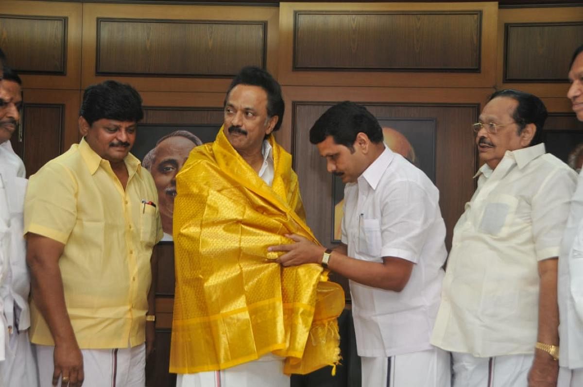 Former AIADMK Minister V Senthil Balaji with DMK President M K Stalin after joining the party. DH Photo