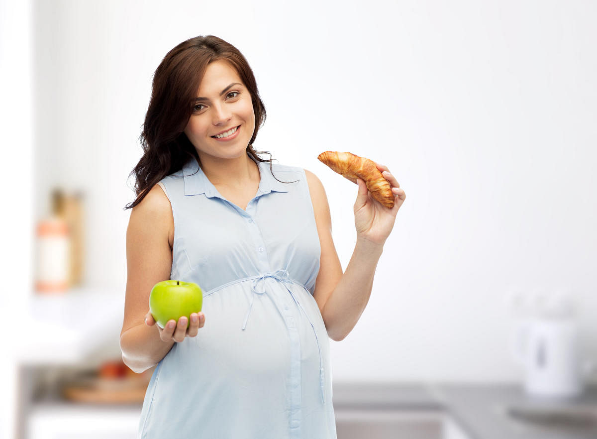 A pregnant woman should consume between 200-300 mg of DHA per day either through her diet or through supplementation.