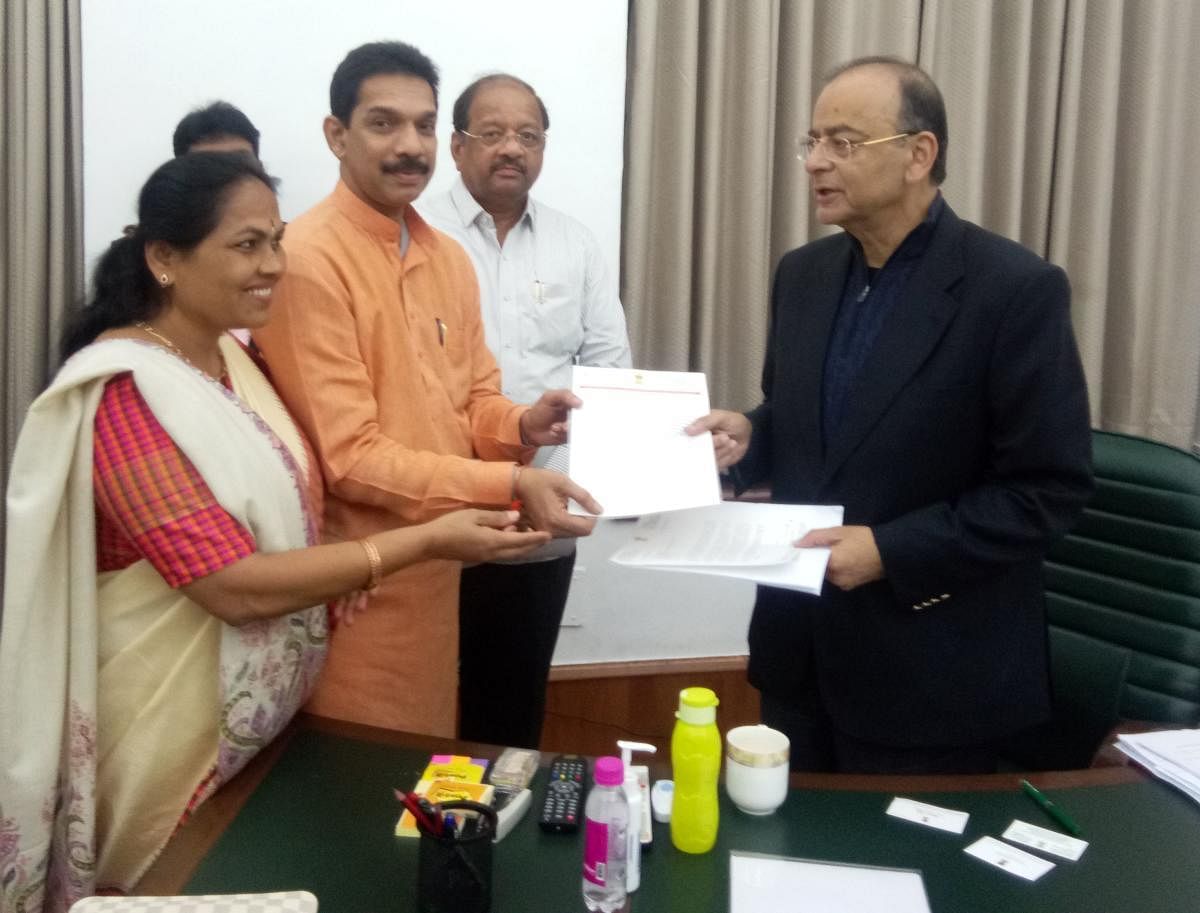 MPs Nalin Kumar Kateel, Shobha Karandlaje and Gopal Shetty submit a memorandum to Union Finance Minister Arun Jaitley in New Delhi on Tuesday.