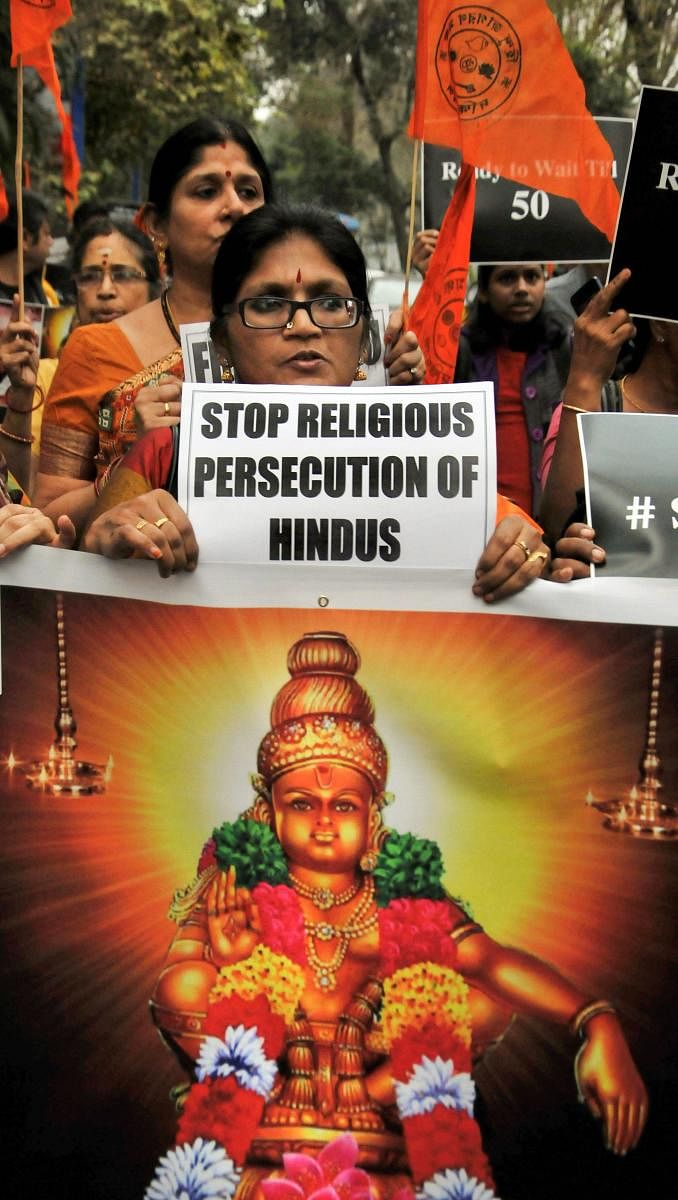 Members of the Hindu Jagran Manch (HJM) participate in a march 'Walk for Ayyappa' in relation to violence faced by devotees at Sabarimala's Ayyappa temple, in Kolkata. PTI