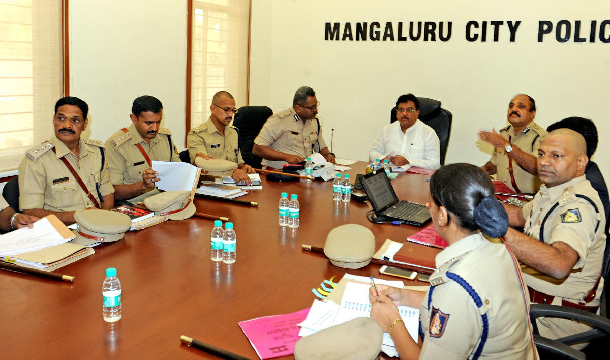 Home Minister M B Patil takes part in a meeting of senior police officers in Mangaluru on Monday.