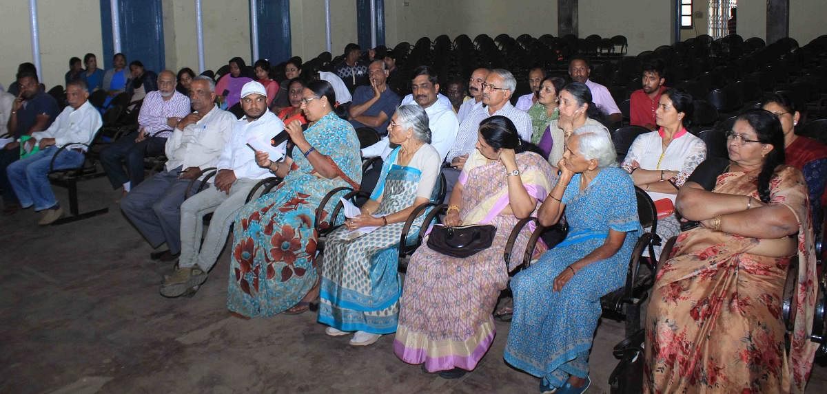 Residents in Madikeri CMC limits take part in a preliminary budget meeting held at Kaveri Kalakshetra in Madikeri on Wednesday.