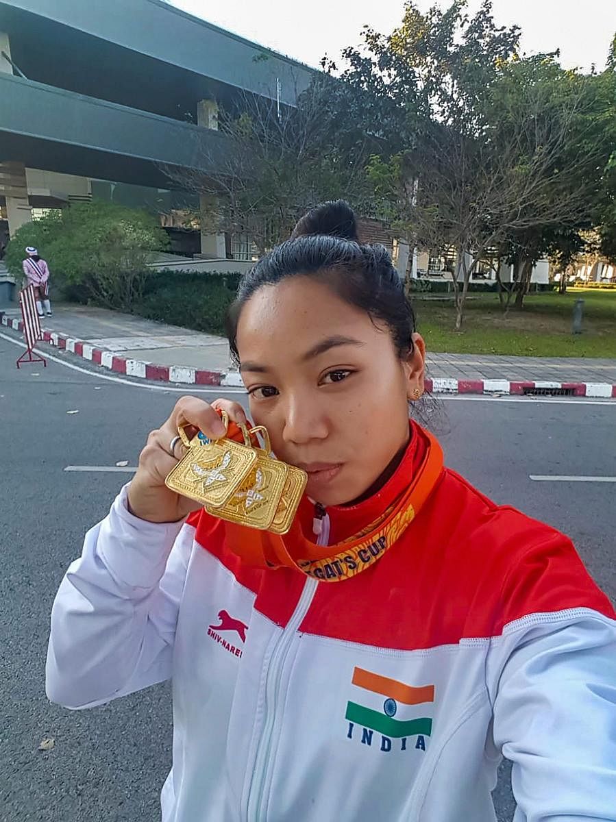 Mirabai Chanu clicks a selfie after winning gold at the EGAT Cup in Chiang Mai, Thailand, on Thursday. Twitter