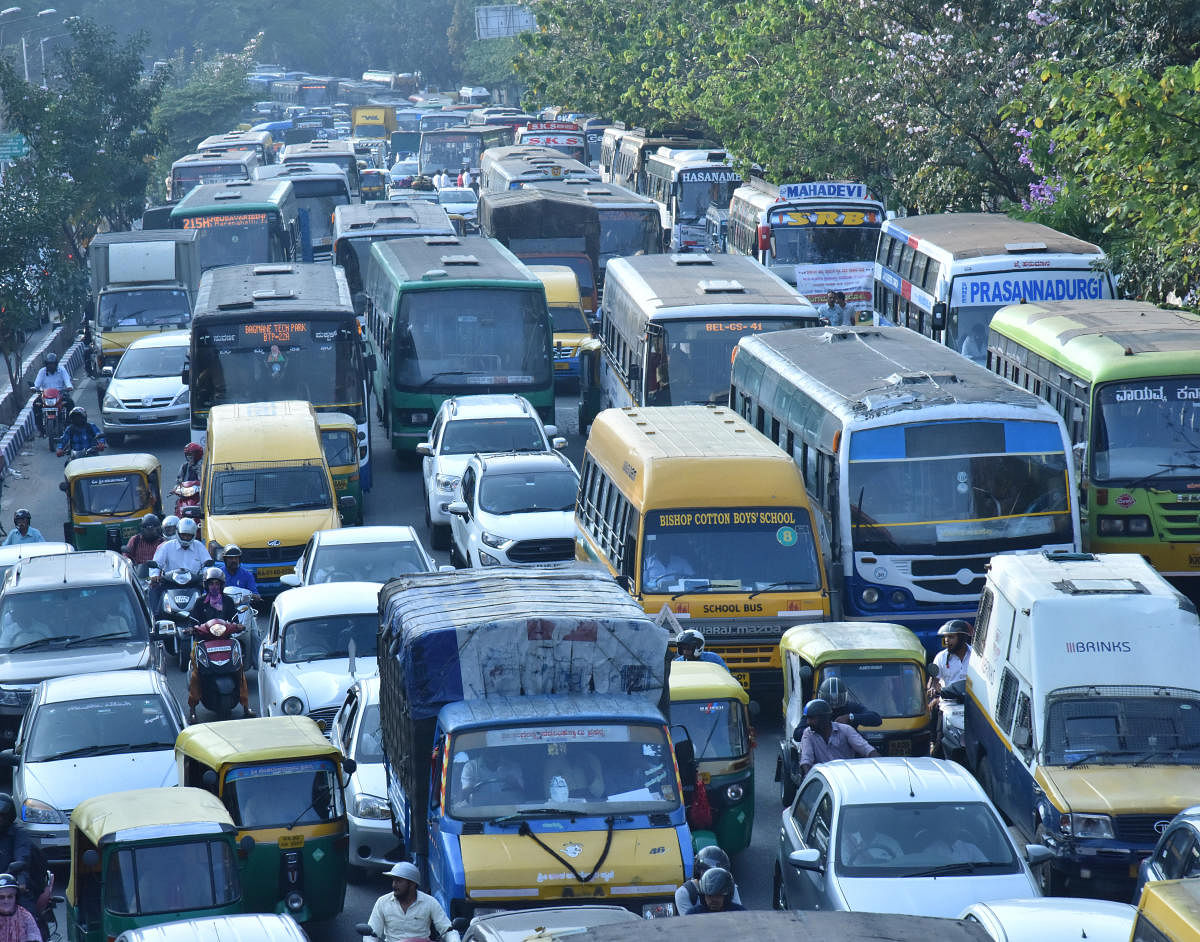 Heavy traffic jam on Seshadri road during the six protest in Freedom park along with two procession of Savitha Maharshi Jayanthi at Vidhana soudha, in Bengaluru. DH Photo by Janardhan B K