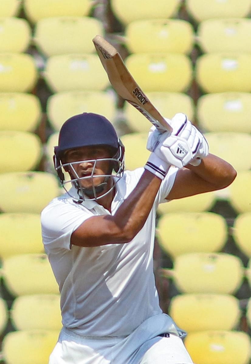 DEPENDABLE: Vidarbha's Ganesh Satish en route his match-winning 87 against Rest of India on the fifth and final day of the Irani Cup in Nagpur. PTI 