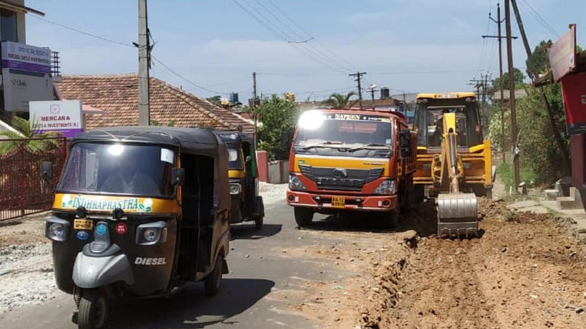Widening work in progress on the road leading to the new private bus stand in Madikeri.