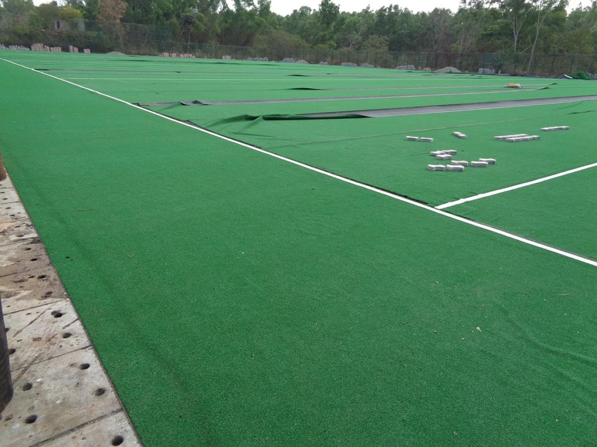 The work on laying the turf mat on the playground of Koodige Sports Residential School is in the last stage.