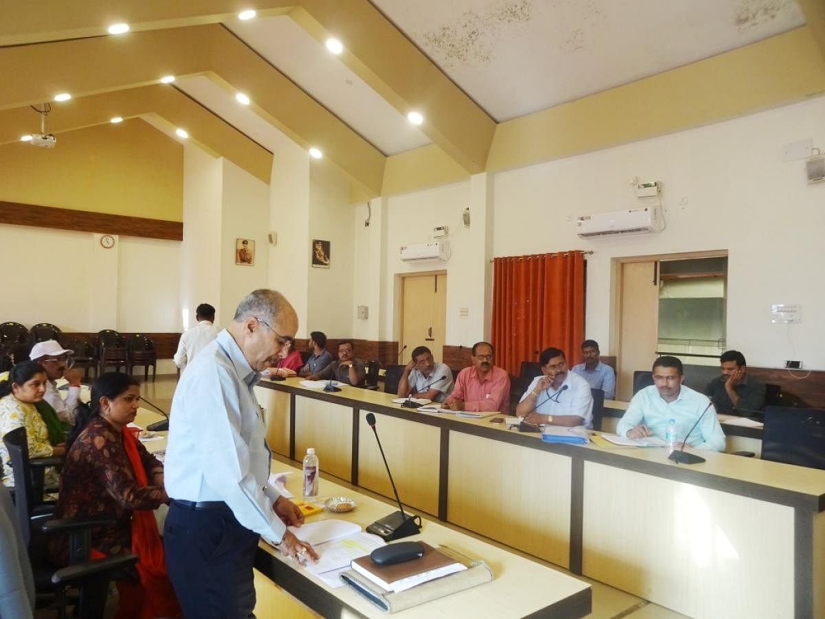 Regional Transport Officer Gangadhar speaks during the road safety meeting at the DC’s office in Madikeri.