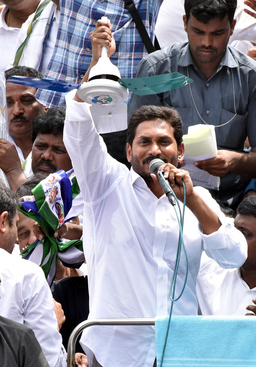 Jagan in campaign photo with party symbol fan