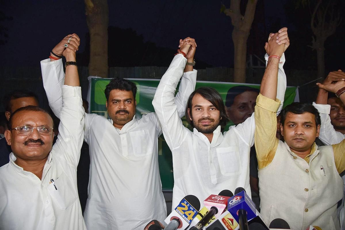 Patna: RJD MLA Tej Pratap with his supporters during the announcement of his new party Lalu Rabri Morcha at a press conference, in Patna, Monday, April 1, 2019. (PTI Photo) (PTI4_1_2019_000116B)