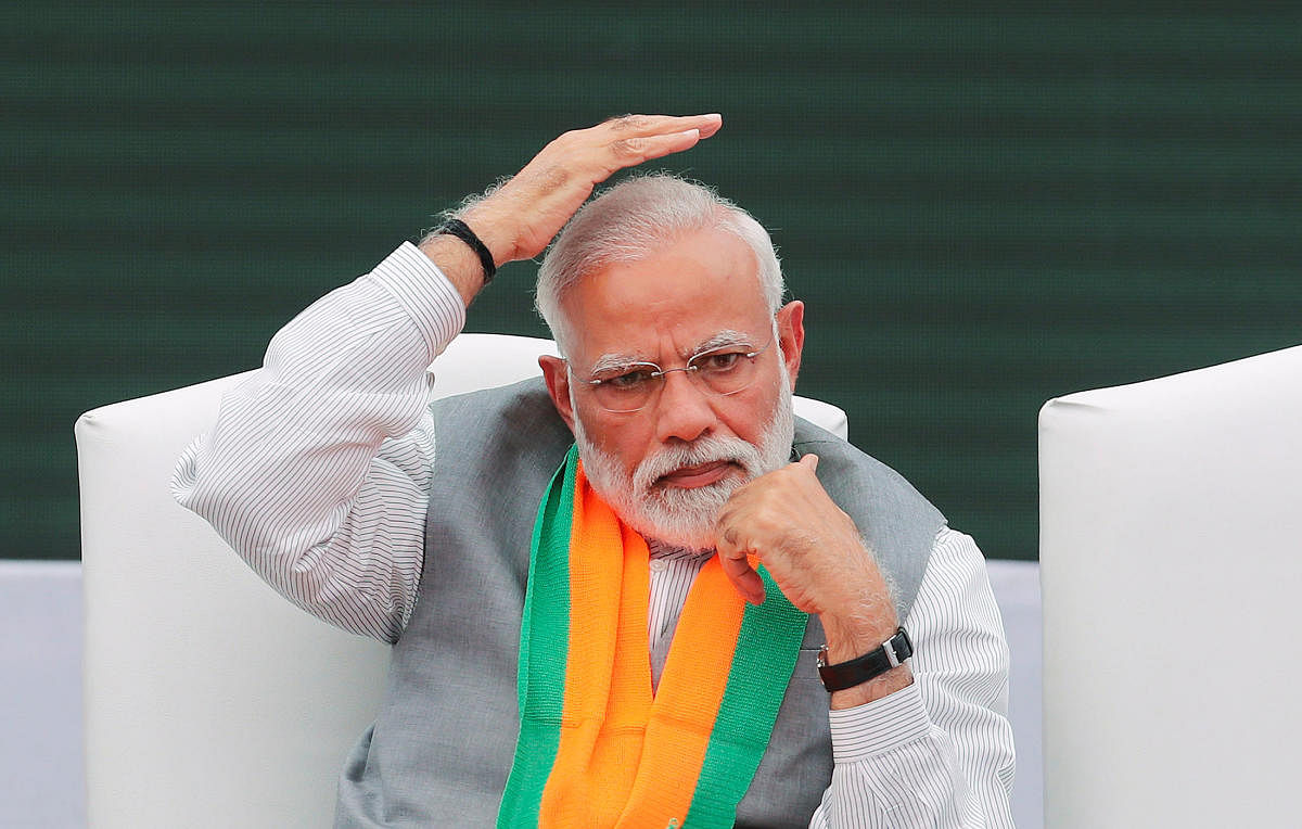 Prime Minister Narendra Modi gestures after releasing Bharatiya Janata Party's election manifesto in New Delhi. (Reuters Photo)