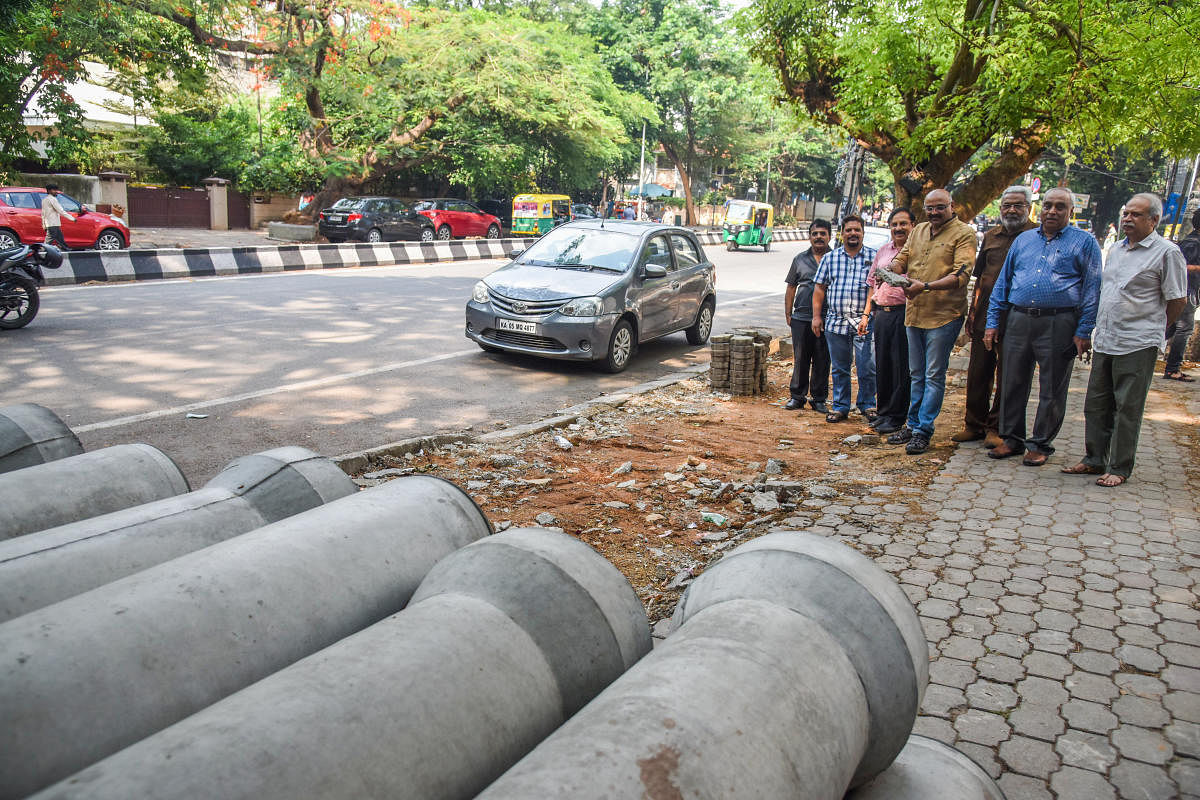 (From left) S Manjunath, Mallikarjun, A C Chandrashekar, Dr Kiran Kumar, R V Nagaraj, G S Bhaskar and Jayashekar Yale are the residents of Jayanagar and Basavanagudi, who have filed a PIL against the unscientific way in which the white-topping work is being done. They contend that there is no need for white-topping as the road is in perfect condition.