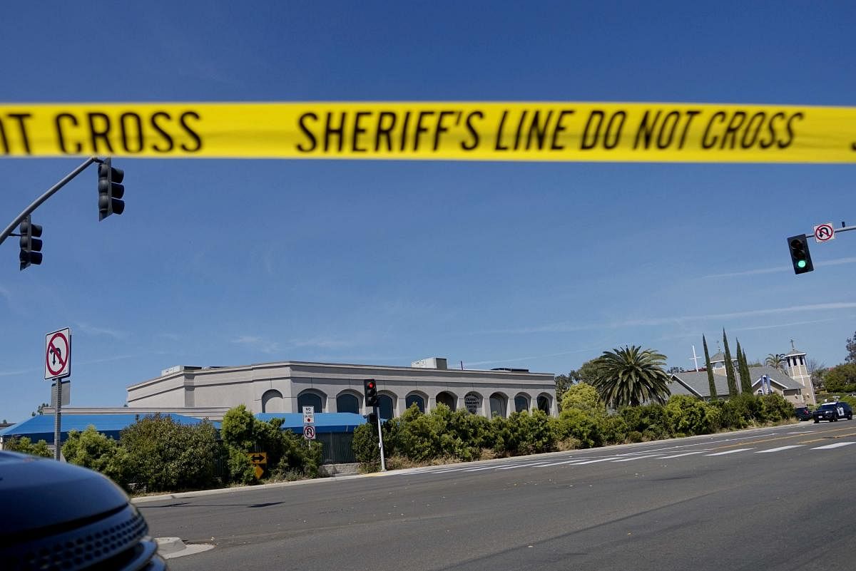 TOPSHOT - Sheriff's crime scene tape is placed in front of the Chabad of Poway Synagogue after a shooting on Saturday, April 27, 2019 in Poway, California. - A gunman opened fire at a synagogue in California, killing one person and injuring three others i
