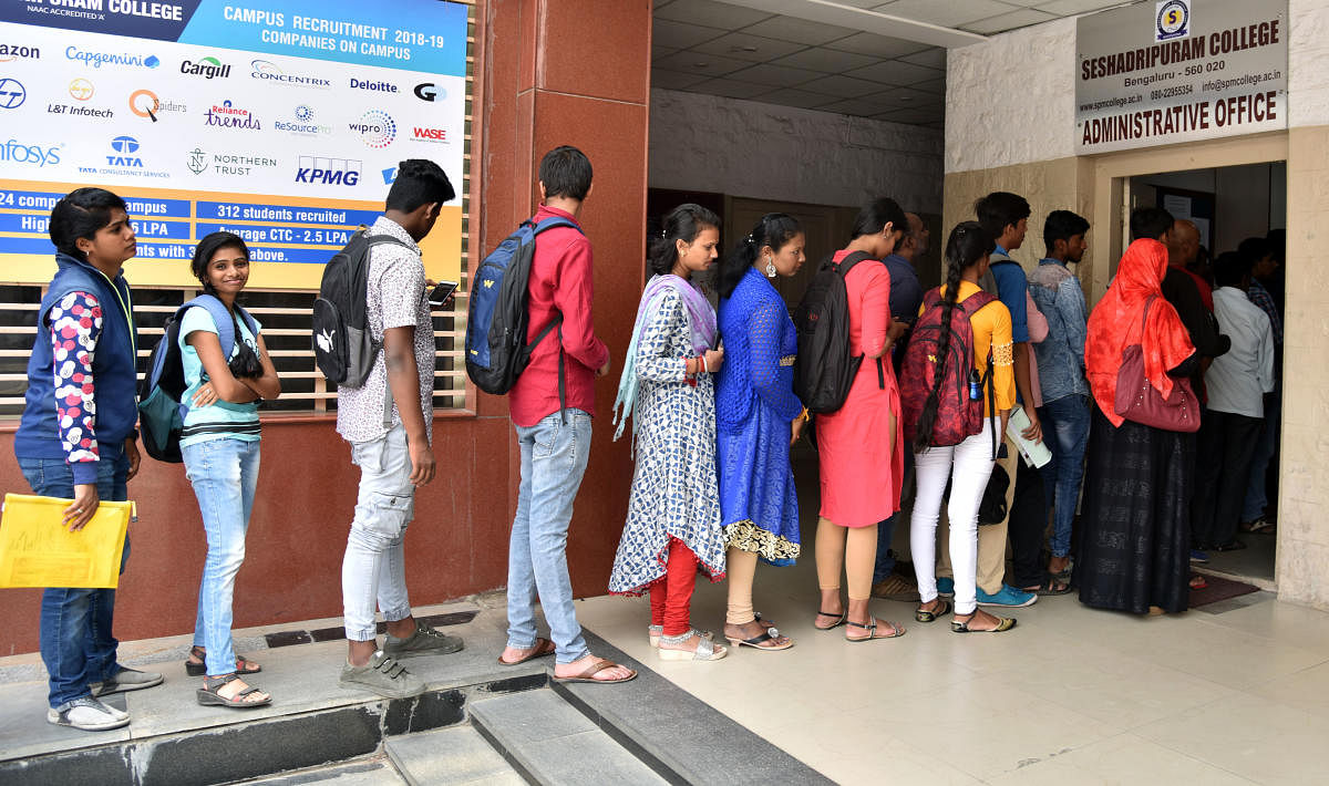 Students waiting in a line to get applications form for PUC &amp; Degree at Sesadripura College in Bengaluru on Thursday, 02 May, 2019. Photo by Janardhan B K
