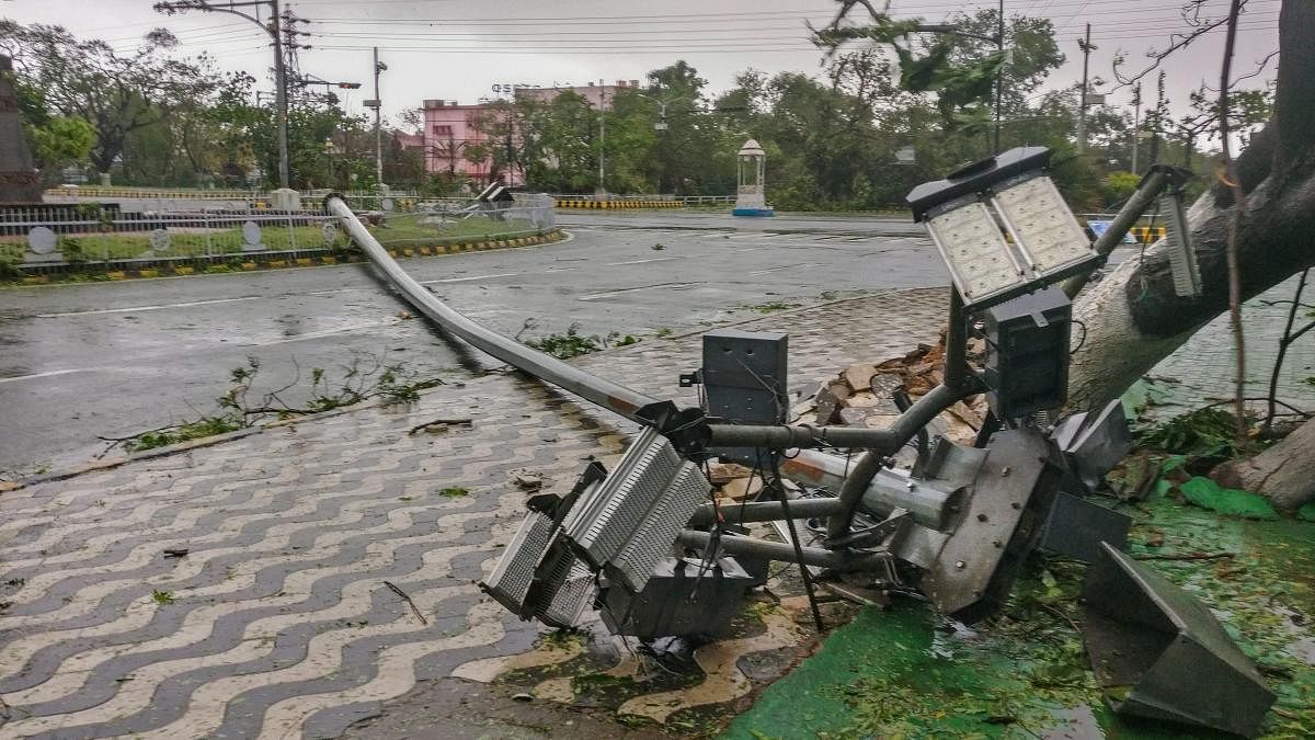 A wind uprooted street light lies on a road after Cyclone Fani made landfall, in Bhubaneswar. (PTI Photo)
