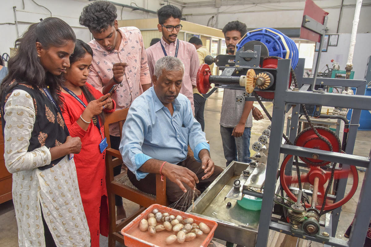 Students look at silk cocoons and reeled silk threads at the National Technology Day organised by the Central SilkTechnological Research Institute at the Central Silk Board in Bengaluru on Saturday. DH PHOTO/S K DINESH