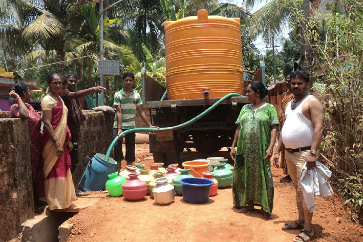 Water is supplied through tankers at Kaveri Road in Yadthare village.