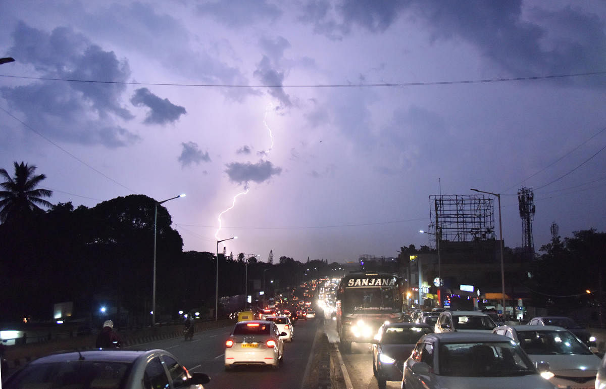 Being in a car during a thunderstorm and not touching metal is safer than being under a tree. This picture is from the Ballari Road flyover.