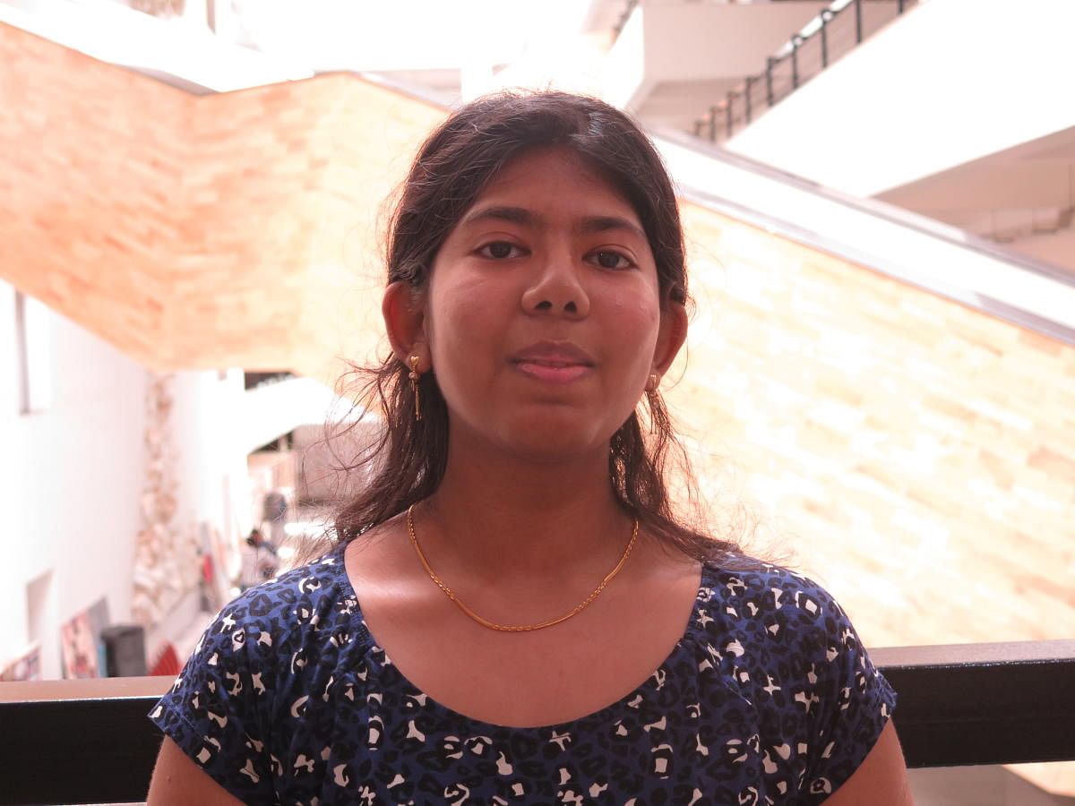 R Shruthi of the St. Joseph's High School, who achieved a second rank in the Pessat test administered by PES University on May 22, poses for the camera in a building on the university's Banashankari campus on May 26, 2019.