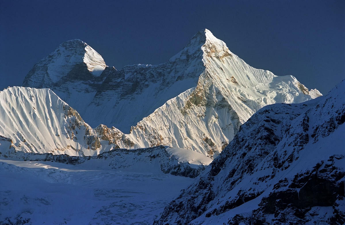 A view of the Nanda Devi and Nanda Devi East twin peak as seen from near Pindari Valley in the Bageshwar district. (PTI File Photo)
