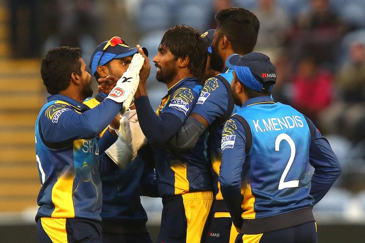 Sri Lanka rallied with the ball to beat Afghanistan by 34 runs in a World Cup match in Cardiff on Tuesday.