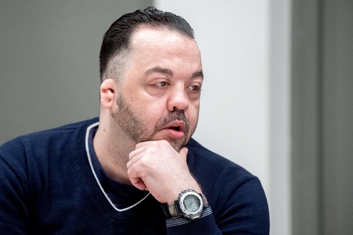 Former nurse Niels Hoegel, accused of killing more than 100 patients in his care, waits at court for his verdict at court in Oldenburg, northern Germany. AFP photo