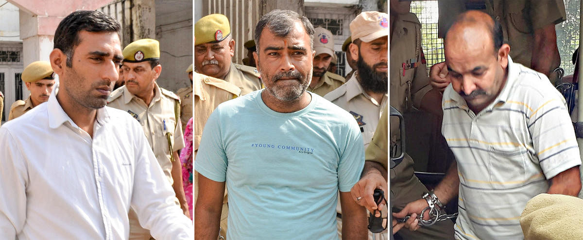 In this combination of three file images, three convicts in the Kathua rape case, from left, SI Anand Dutta, Surender Verma and Constable Tilak Raj are seen in the police custody in 2018. The District and Sessions Court Pathankot Monday, June 10, 2019, awarded them with five years imprisonment in the case. (PTI Photo) N