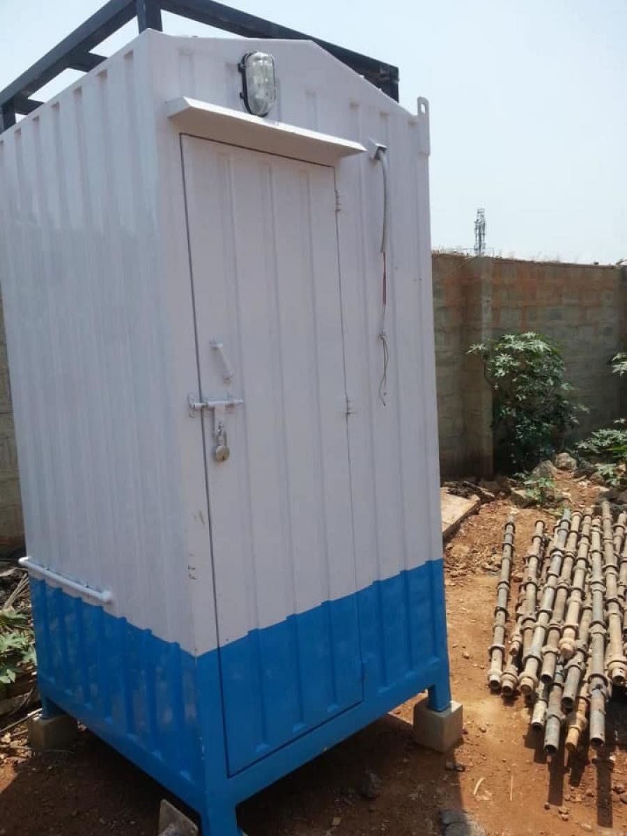 A mobile toilet at the Kundalahalli underpass construction site. Special arrangement