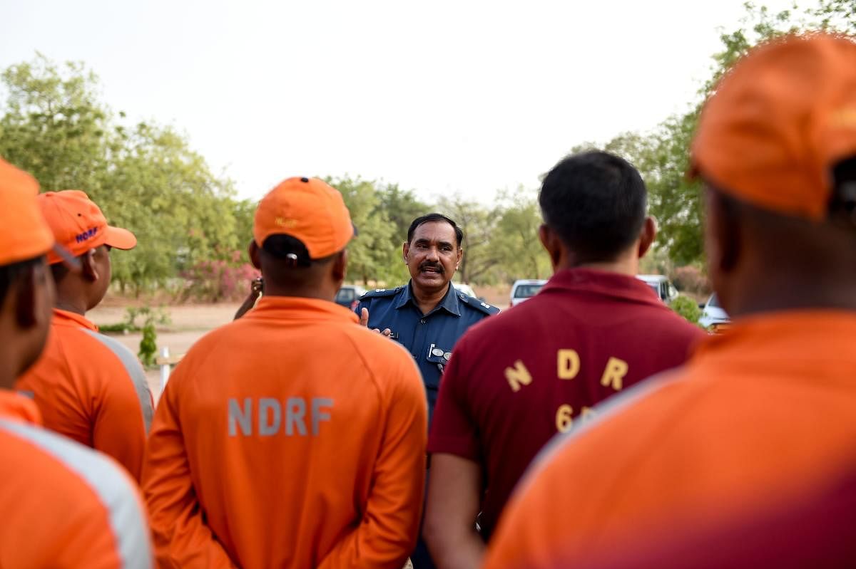 As a way to face the now called cyclone 'Vayu' NDRF personnel are deployed to different coastal regions of the state. (AFP Photo)