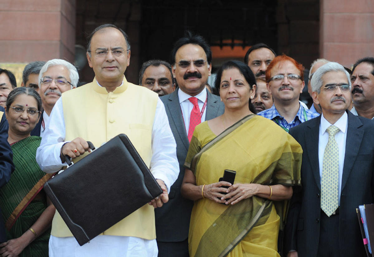 The Union Minister for Finance, Corporate Affairs and Defence, Shri Arun Jaitley departs from North Block to Parliament House along with the Minister of State for Commerce &amp; Industry (Independent Charge), Finance and Corporate Affairs, Smt. Nirmala Sitharaman. (PTI Photo)