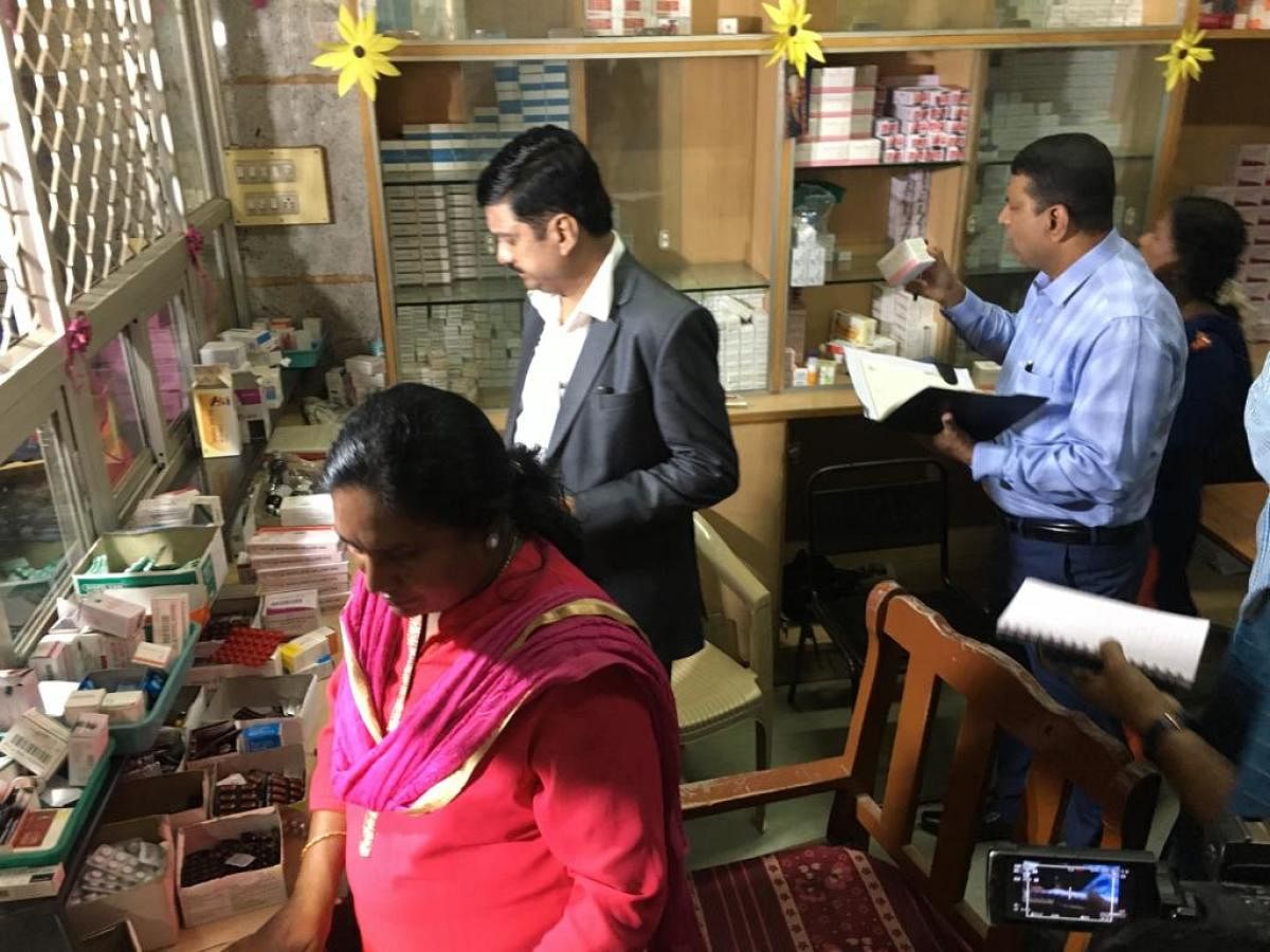 Bengaluru Urban Deputy Commissioner on a surprise visit at a government hospital in KR Puram. He seized drugs past expiry date being distributed to patients.