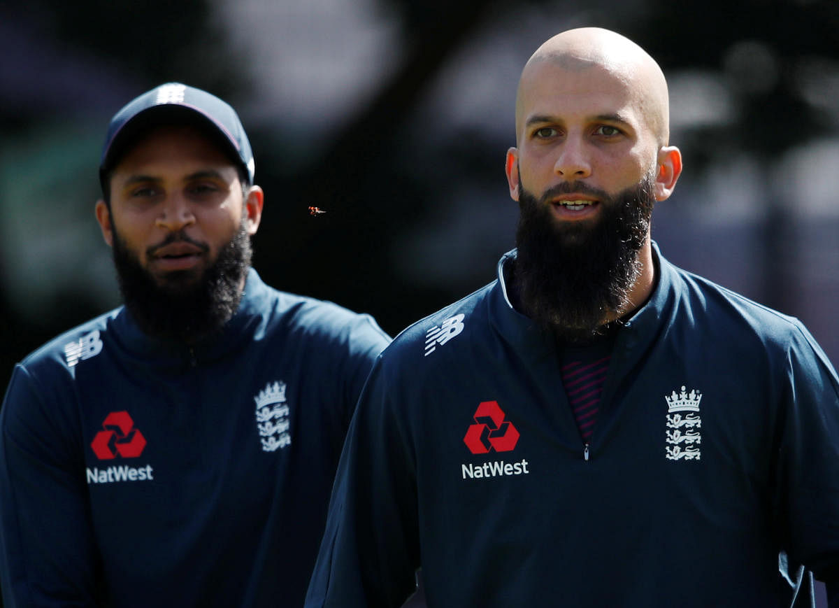 England's Adil Rashid and Moeen Ali during a training session at Edgbaston. (Reuters Photo)