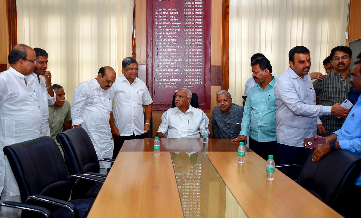 BJP chief B S Yeddyurappa chairs a meeting of party legislators at Vidhana Soudha on Friday.