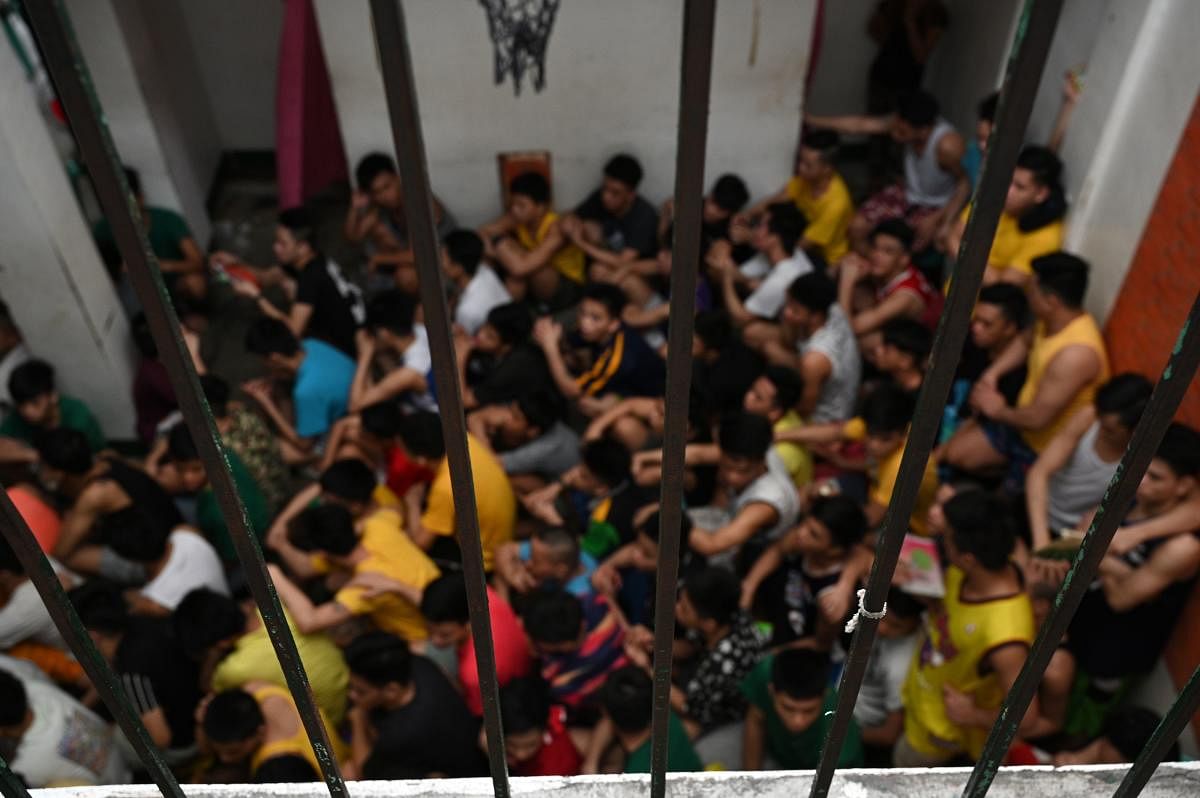 Minors being held at a juvenile detention center gather for roll call in Malolos town, Bulacan province, north of Manila. (AFP File Photo)