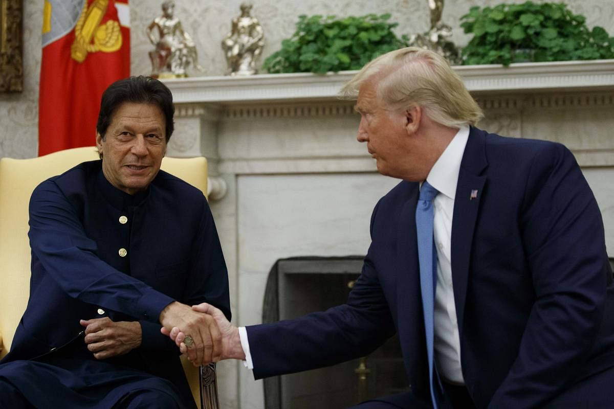 US President Donald Trump shakes hands with Pakistani Prime Minister Imran Khan during a meeting in the Oval Office of the White House. (AP/PTI Photo)