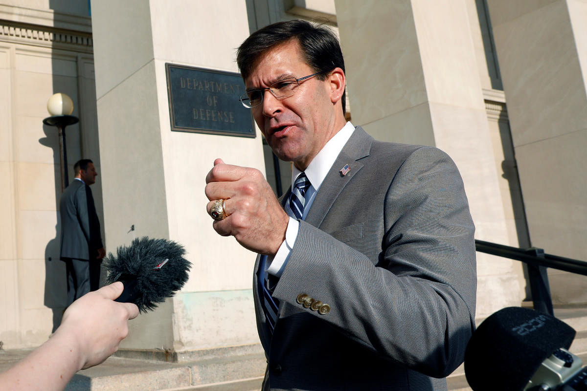 Mark Esper talks to reporters as he arrives for the first day on job as New U.S. Secretary of Defense at the Pentagon in Arlington, Virginia (Reuters Photo)