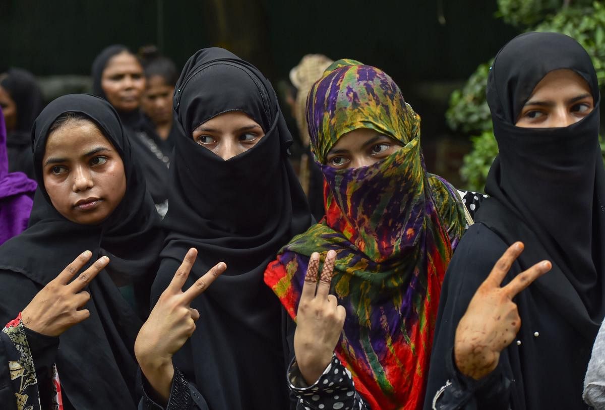 Muslim women celebrate the passage of Triple Talaq Bill. Photo credit: PTI