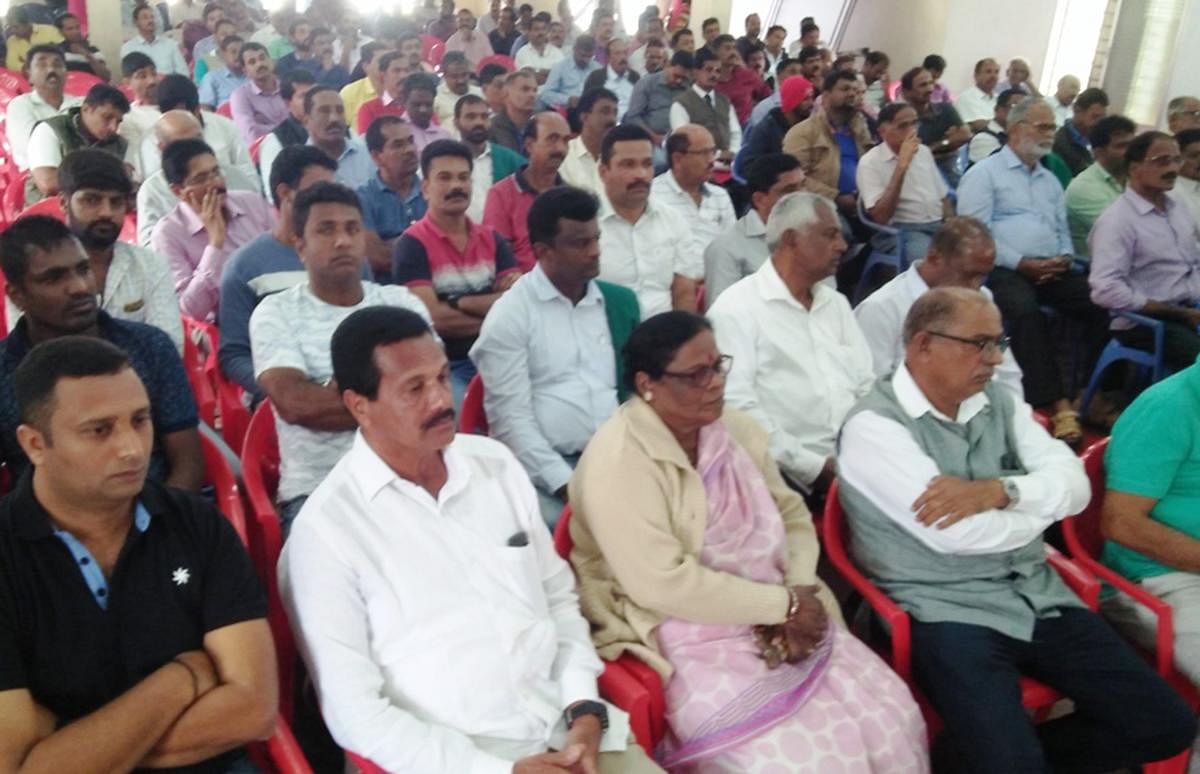 People from various walks of life take part in a condolence meeting organised in memory of Coffee Day founder Siddhartha by Mudigere Coffee Growers' Association in Mudigere.