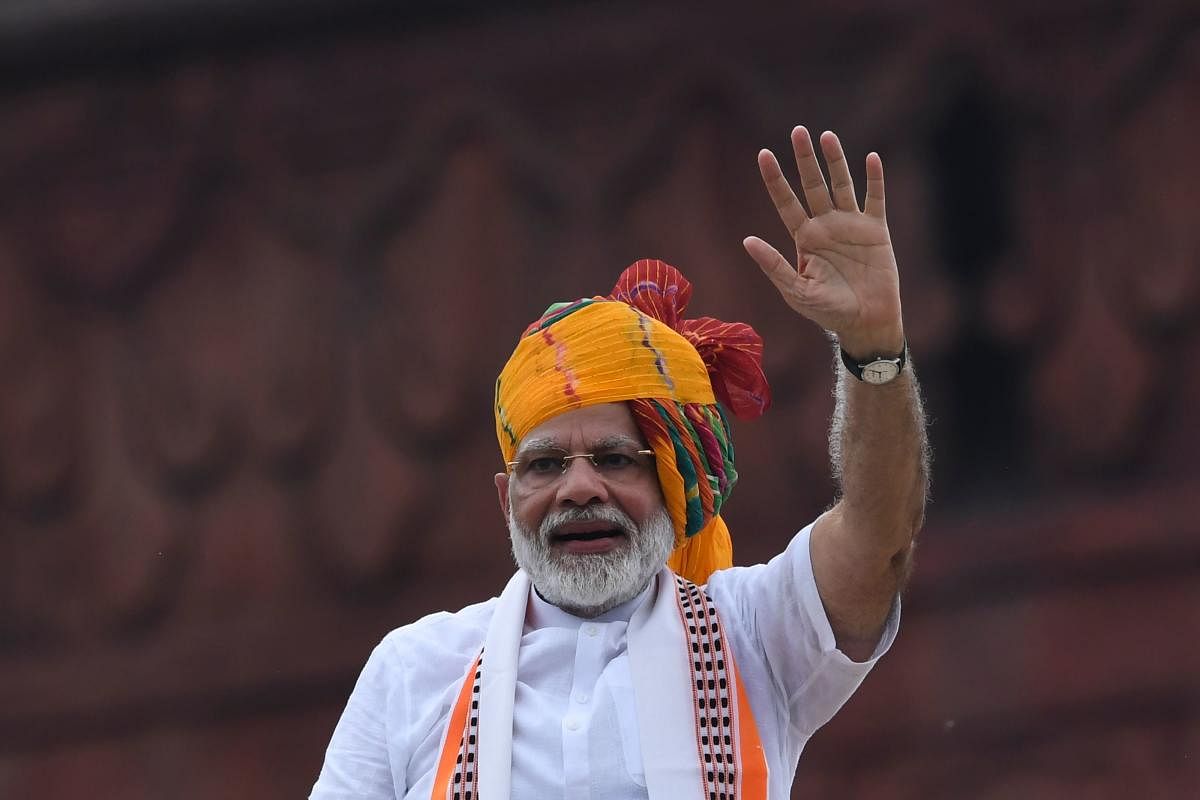 Modi said the mother earth was being destroyed due to excessive use of chemical fertilisers and pesticides. (AFP photo)