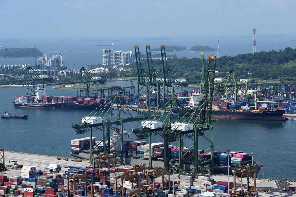 Cargo ships berth at Tanjong Pagar and Pulau Brani container terminals in Singapore. (AFP File Photo)